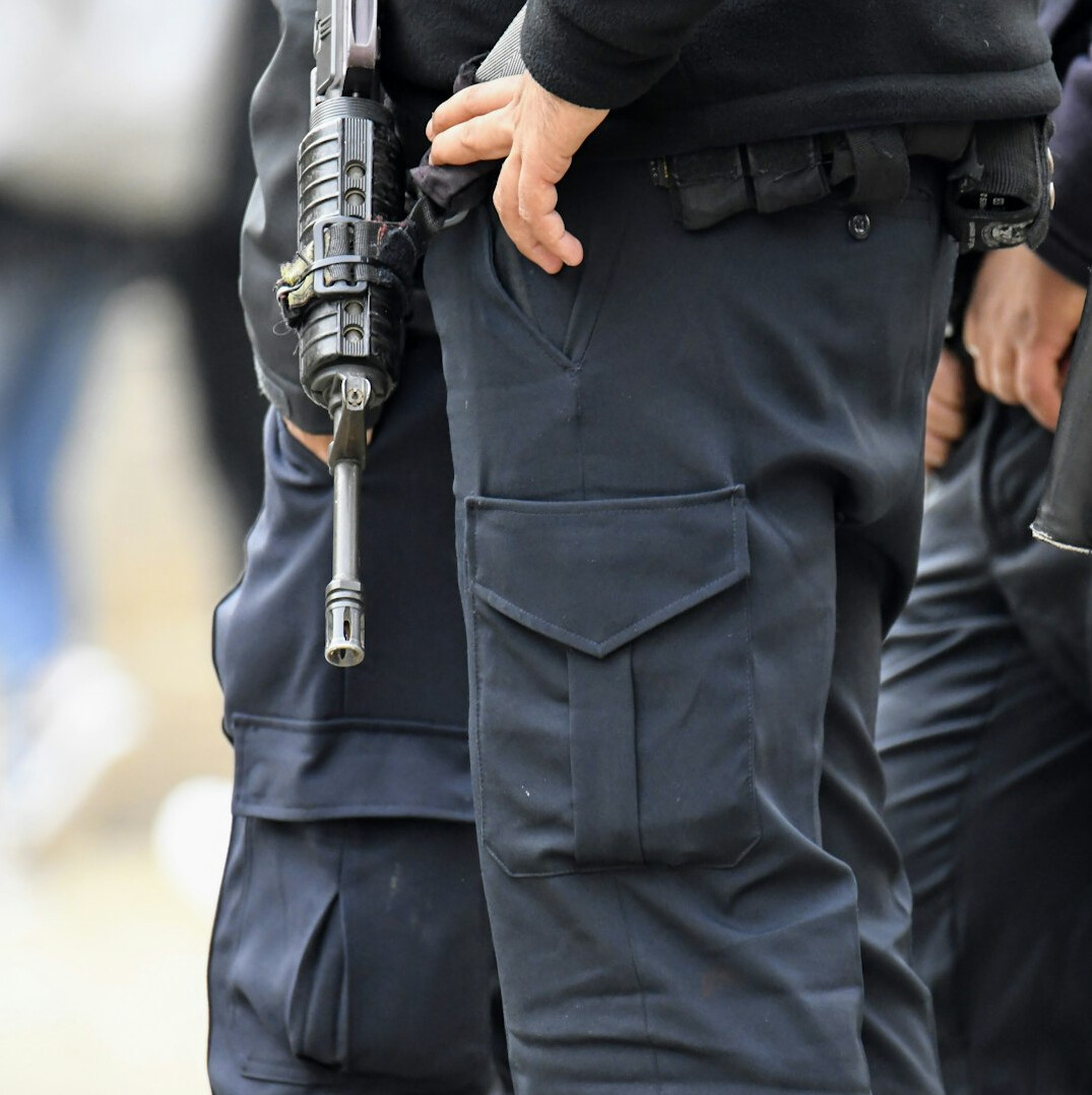 Colleagues working together at laptops