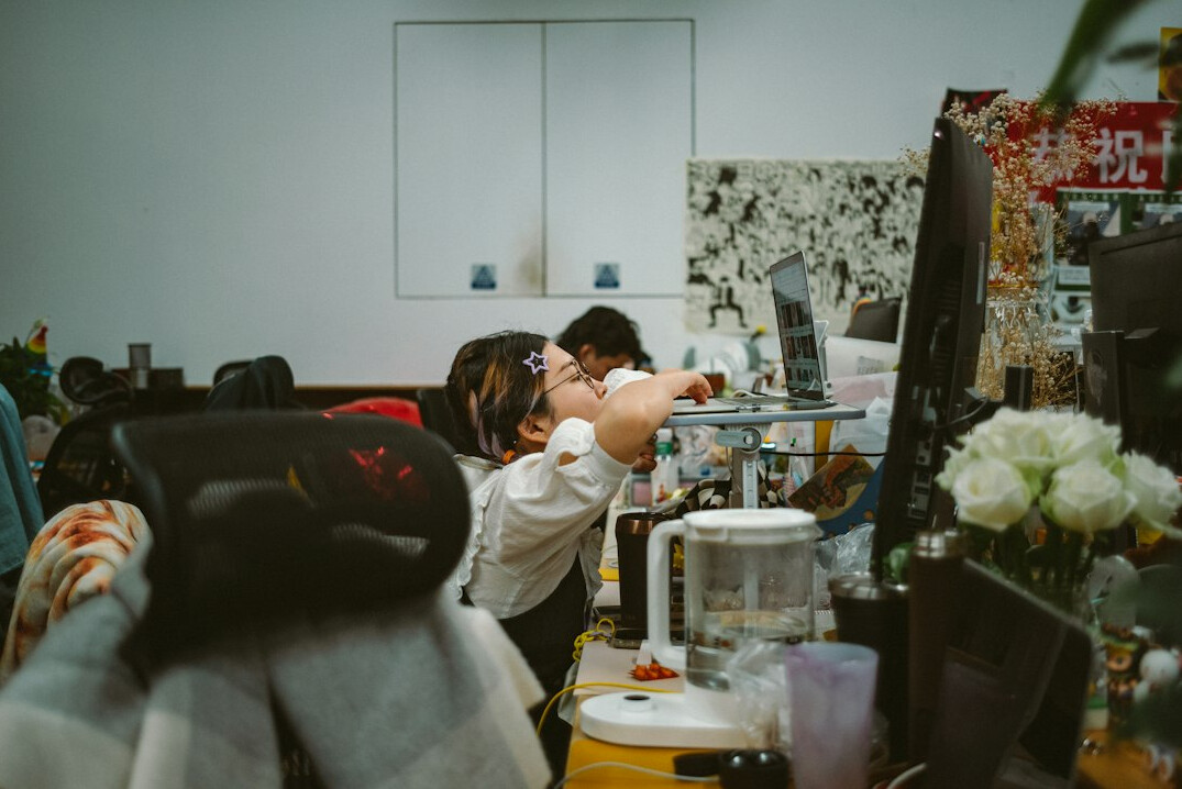 office workers stretching during break