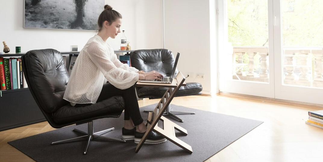 woman doing desk yoga