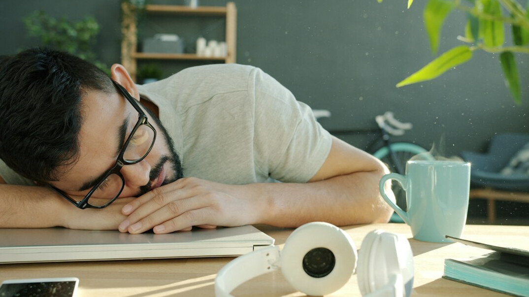 man stretching during work break