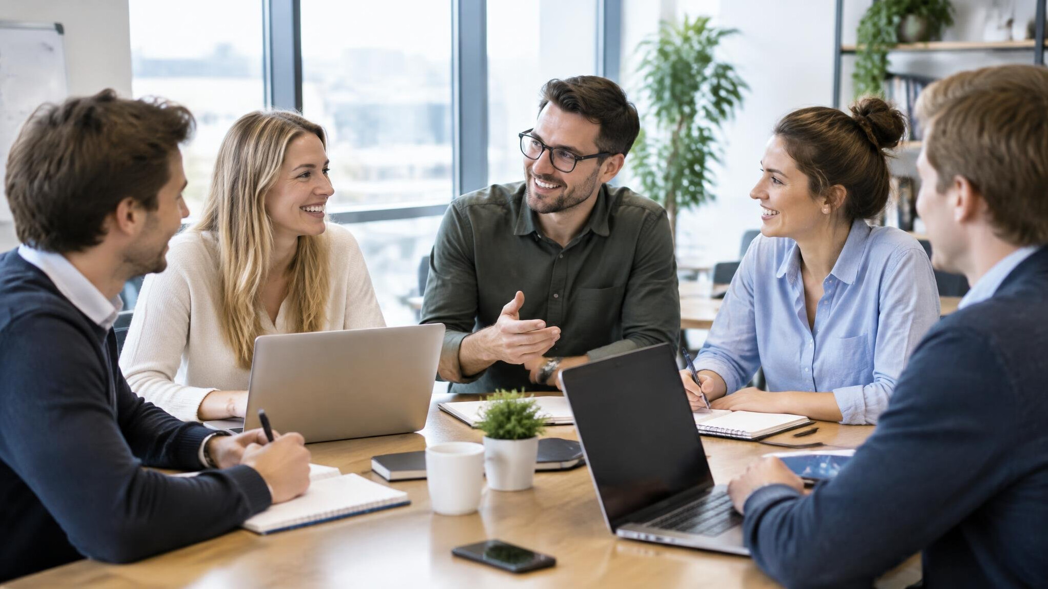 Team members collaborating in a meeting